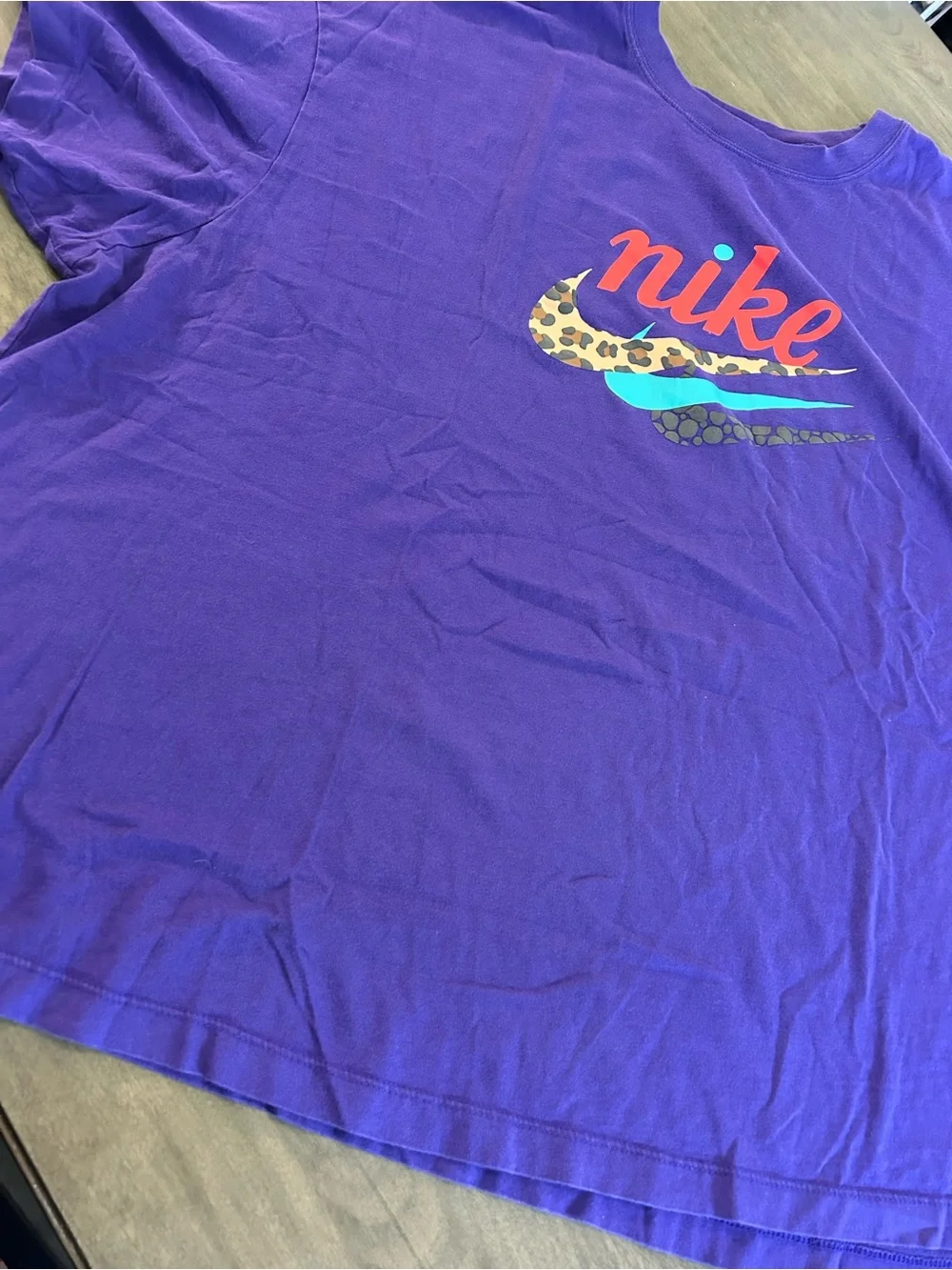 Nike Purple Tee with Red Script and Multicolor Swooshes